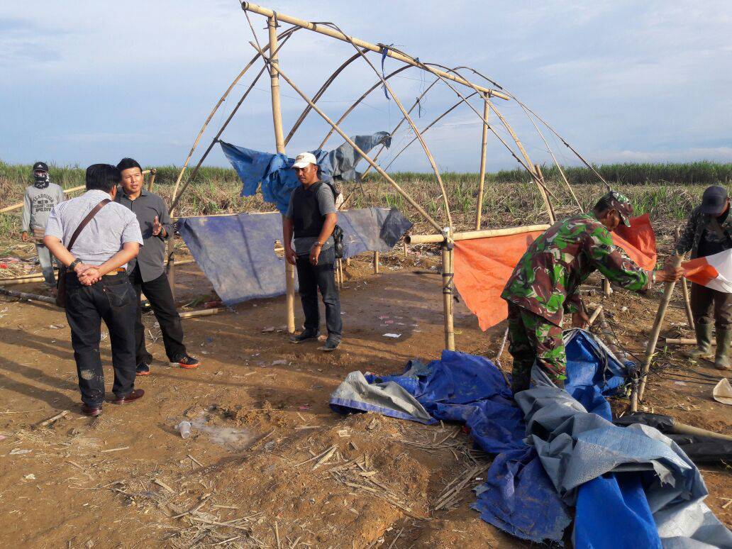 Polisi berhasil mengusir massa yang selama beberapa peran ini menduduki lahan PT BNIL. Foto Dok ragamlampung.com